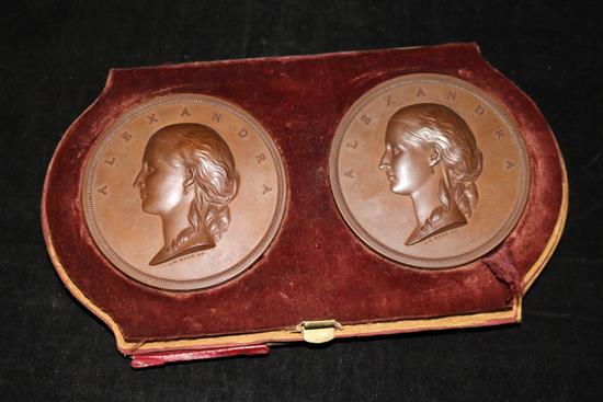 A pair of bronze medals by J. S. Wyon, 1863, commemorating the London visit of Princess Alexandra, diameter 76mm, case at fault